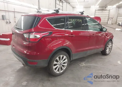 2017 Ford Escape Titanium z USA, uszkodzony, nr VIN 1FMCU9J91HUD59747